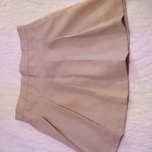 Tan pleated school skirt